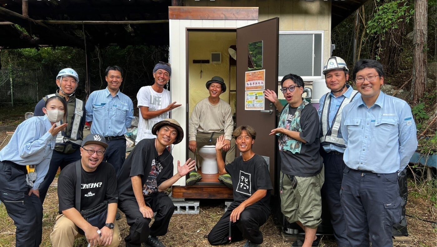 開拓を手伝った支援者・ボランティアとメンバーの集合写真